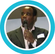 Brian T. Hammond speaking with a microphone